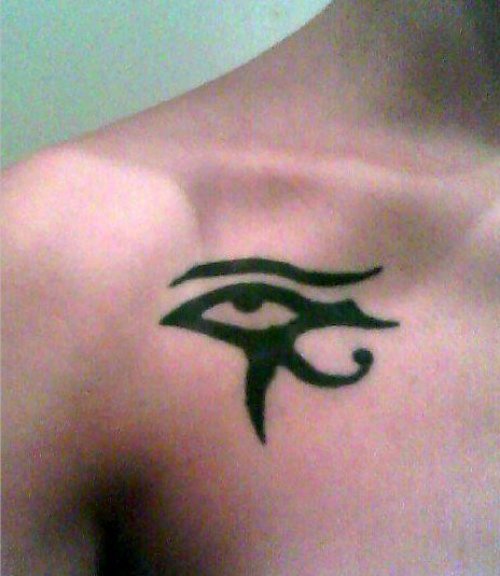 Black Horus Eye Tattoo On Right Collarbone